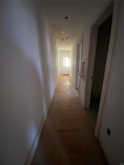 Corridor featuring light hardwood / wood-style flooring