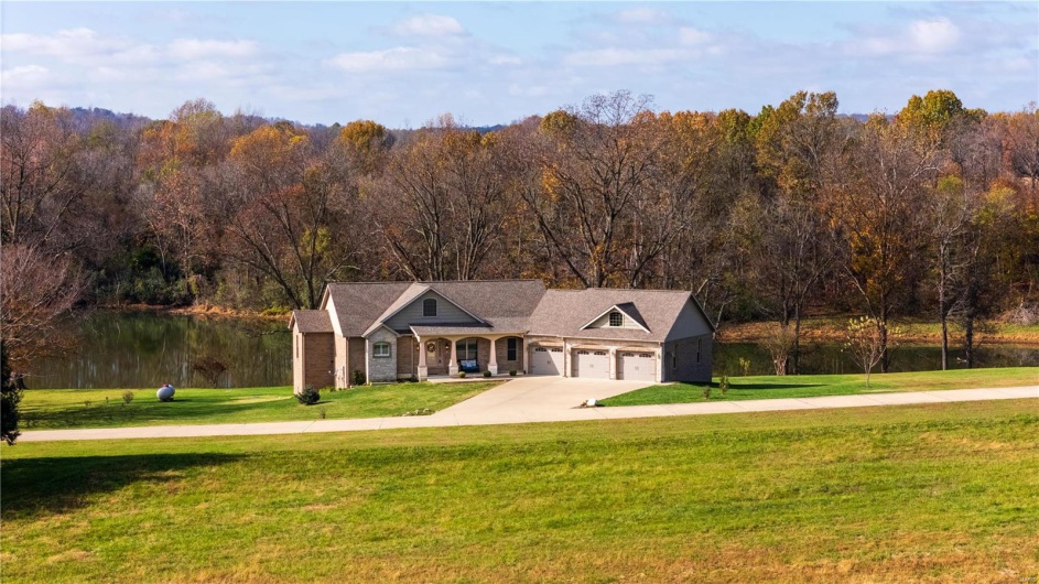 View of front of house with water view.