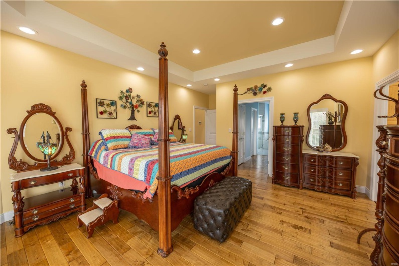 Primary bedroom featuring light hardwood  flooring.