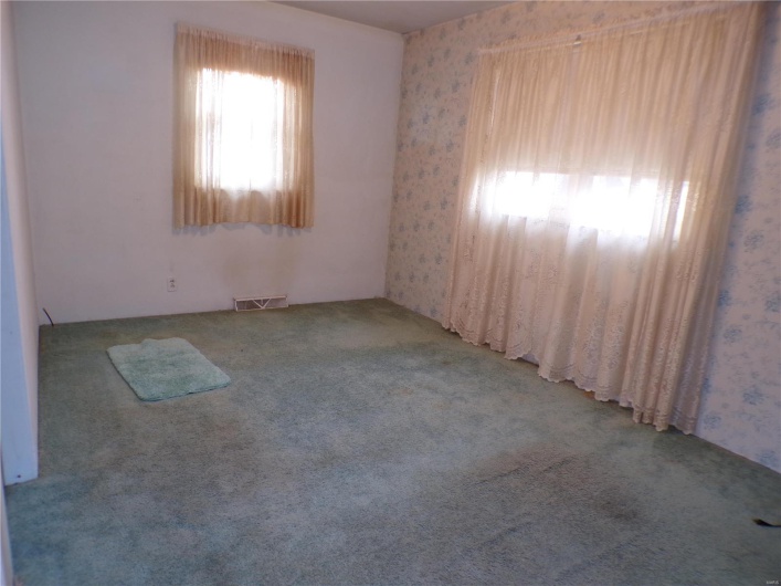 Larger bedroom with plenty of natural light