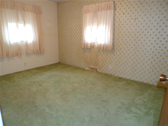 Large Bedroom with plenty of natural light.