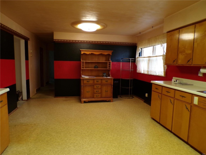 Ample Dining Area located at end of Kitchen. 