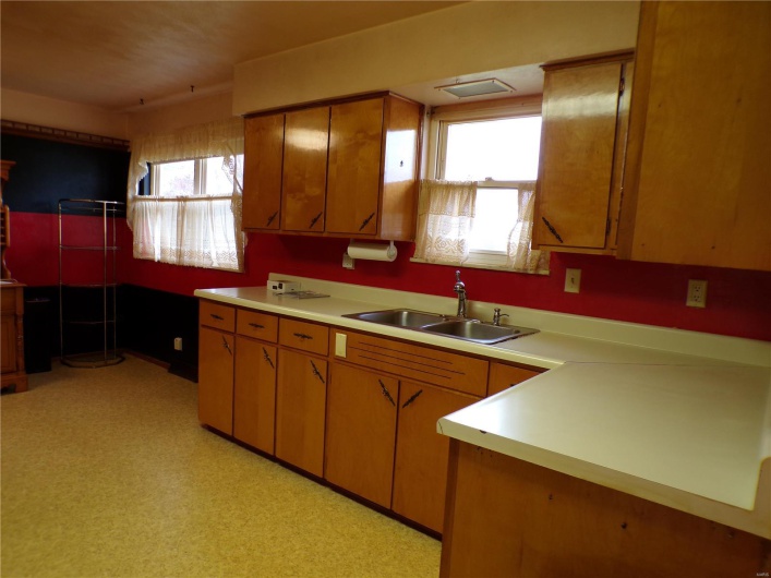 Kitchen with a large Dining area and wealth of natural light.