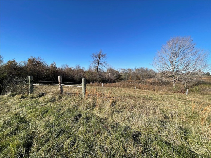 View of yard with a rural view