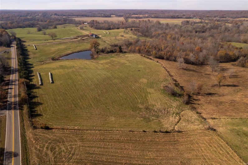 Bird's eye view with a rural view and a water view