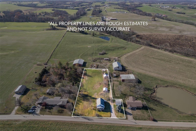 Aerial view with a rural view and a water view