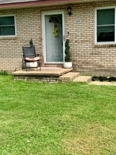 Property entrance featuring a yard