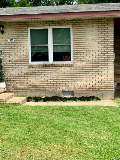 View of home's exterior featuring a lawn