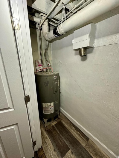 Utility room with electric water heater