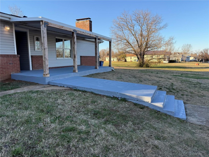 View of yard featuring a porch
