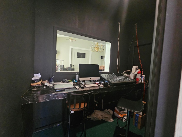 Office space with an inviting chandelier