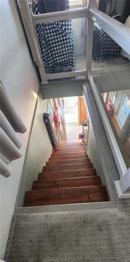 Staircase with carpet floors