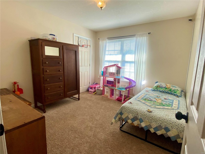 Bedroom featuring carpet