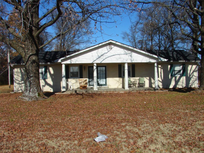Ranch-style home with a porch