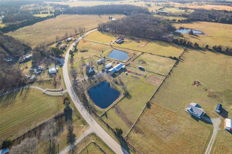 Aerial view with a rural view and a water view