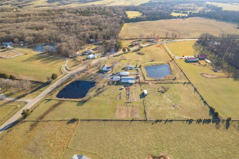 Drone / aerial view with a rural view and a water view