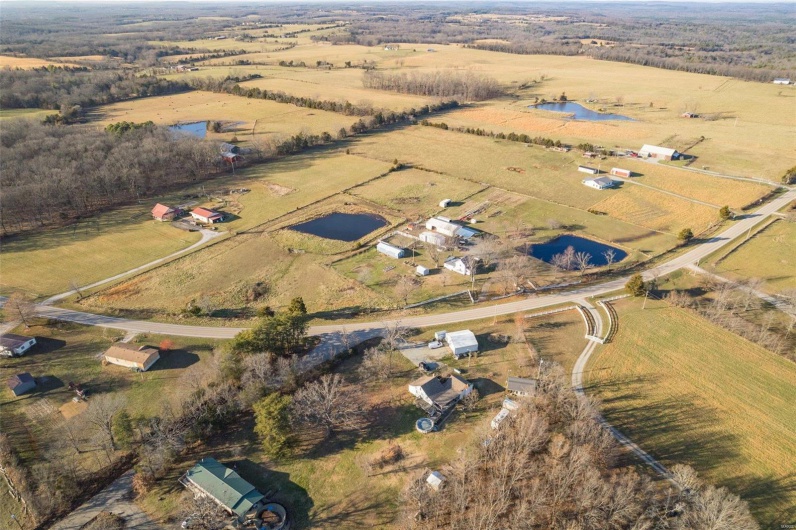 Aerial view with a rural view and a water view