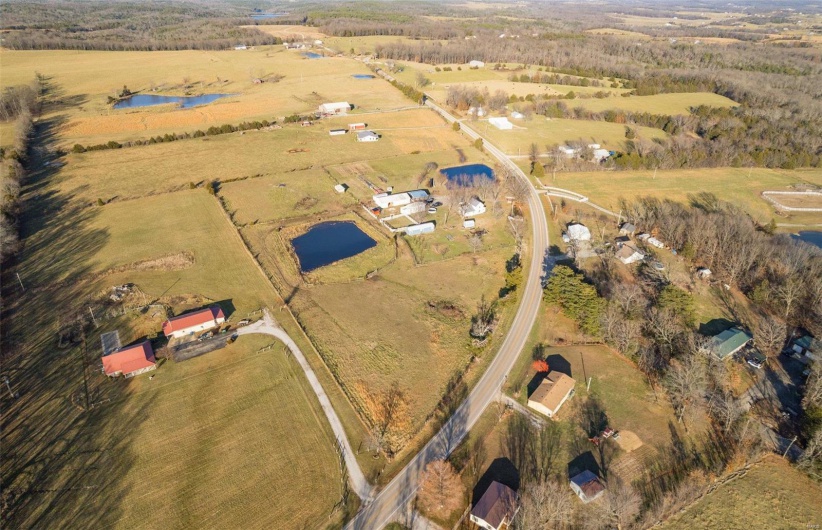 Drone / aerial view featuring a rural view and a water view