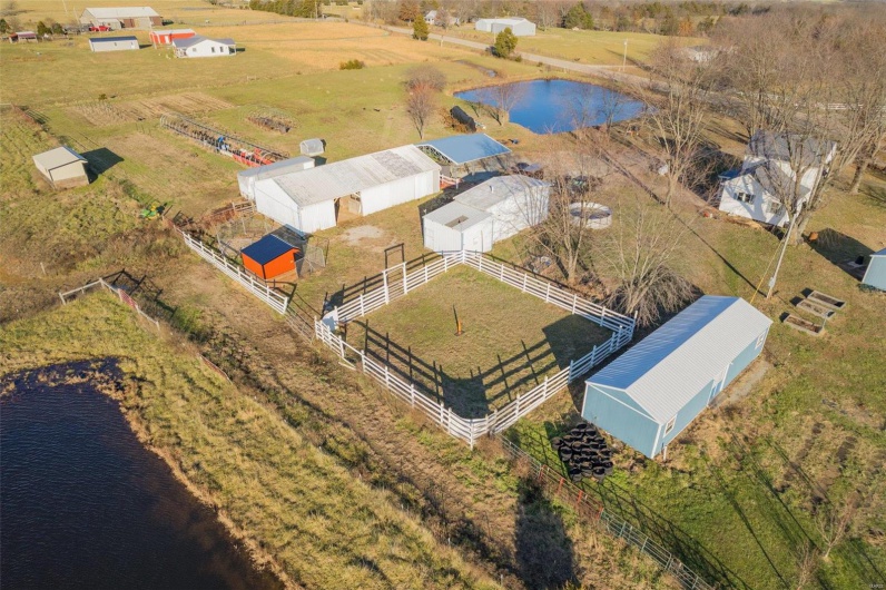 Bird's eye view featuring a water view and a rural view