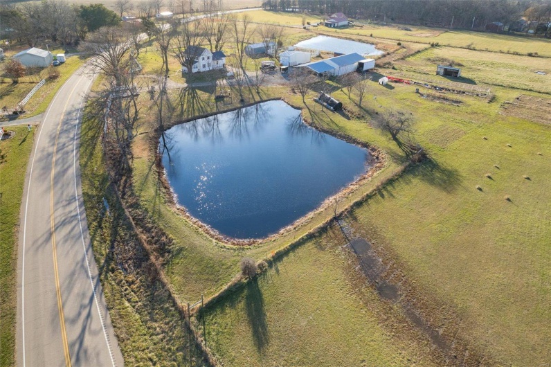 Bird's eye view with a rural view and a water view