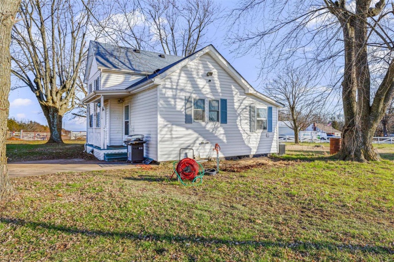 View of front of property with a front yard