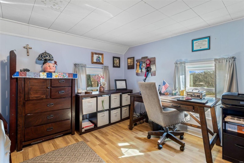 Home office featuring light hardwood / wood-style flooring
