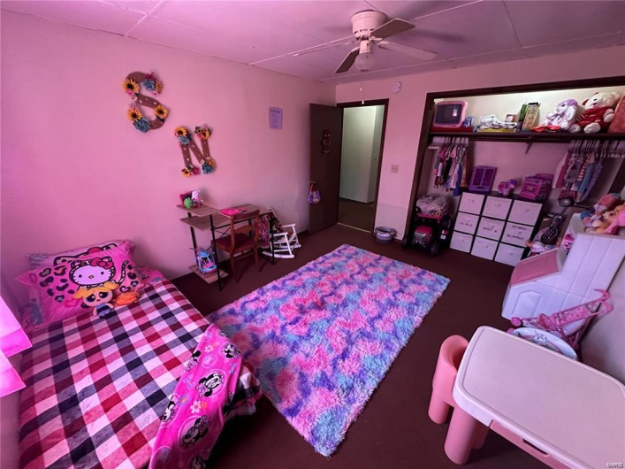 Bedroom featuring ceiling fan