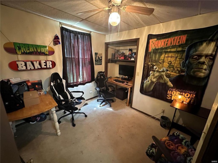Home office featuring ceiling fan