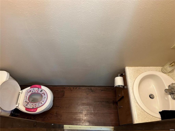 Bathroom with vanity and toilet