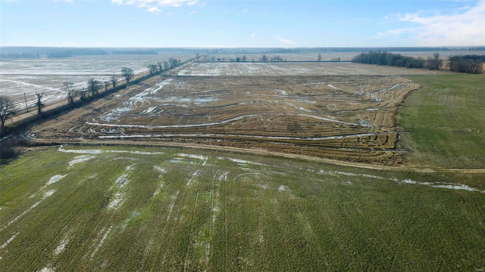 Birds eye view of property featuring a rural view