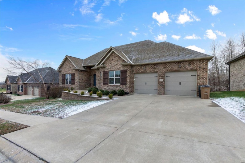 View of front of home featuring a garage