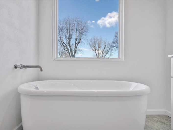Bathroom featuring a washtub