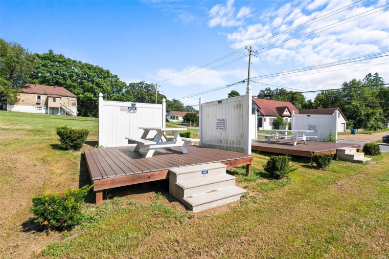 Wooden terrace with a lawn