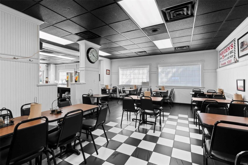 Dining area with a paneled ceiling