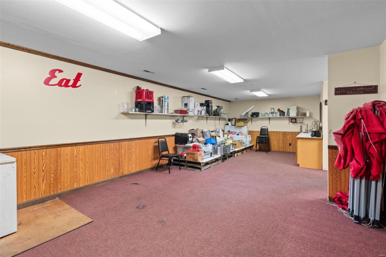 Misc room with carpet flooring and ornamental molding