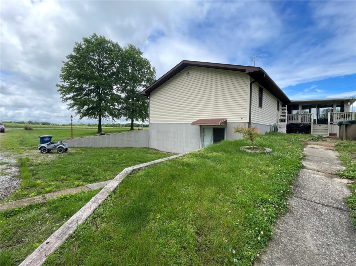 View of front of home featuring brick siding