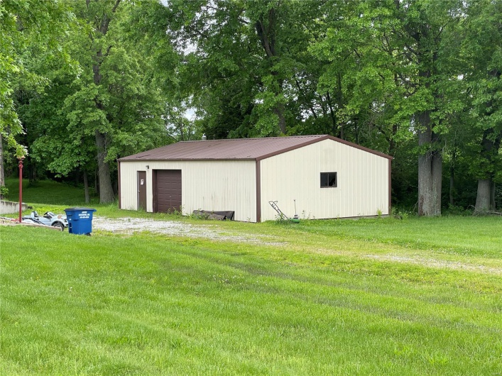 View of outbuilding featuring an outbuilding