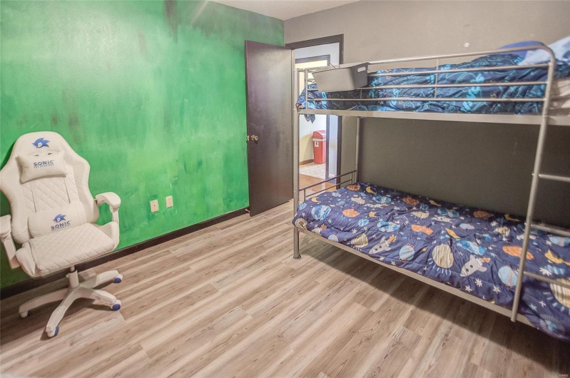 Bedroom featuring hardwood / wood-style flooring