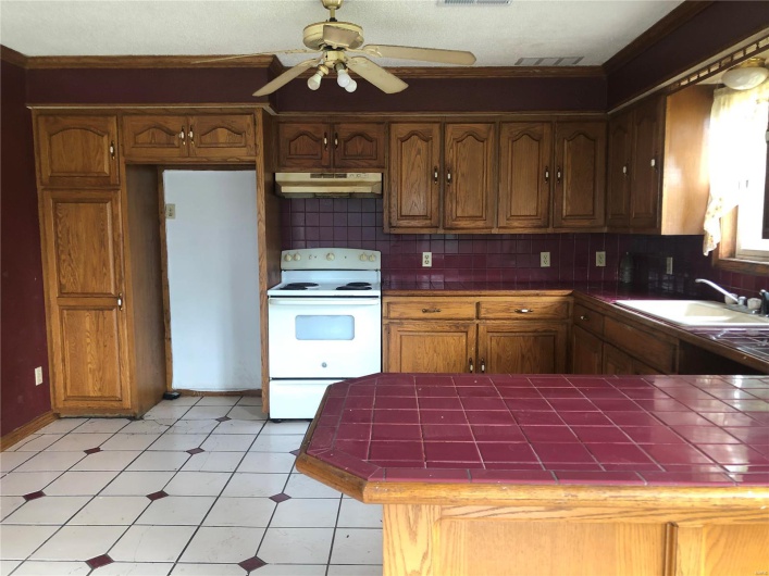 Kitchen with ceramic tile floor