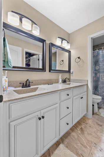 Bathroom with vanity and toilet