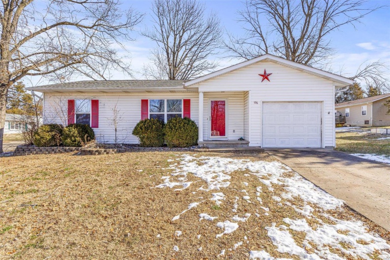 Single story home with a garage