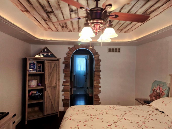 Bedroom featuring a tray ceiling