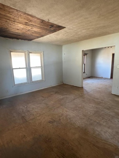 Spare room with a textured ceiling