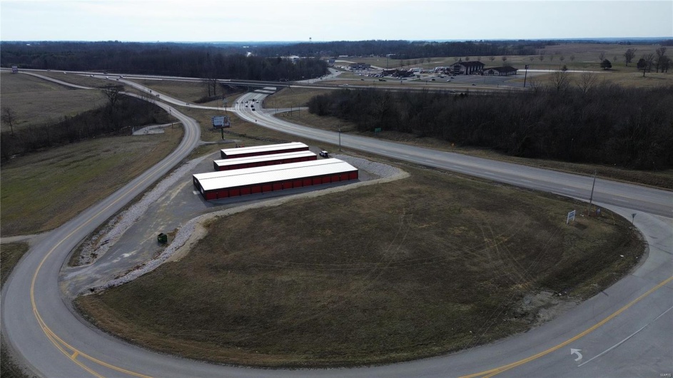 Birds eye view of property featuring a rural view