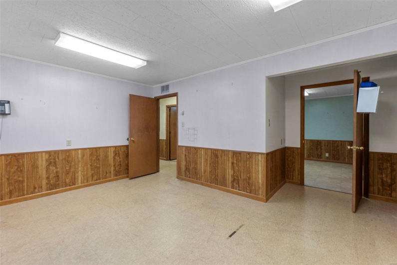 Unfurnished room with crown molding
