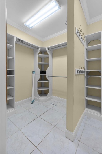 Spacious closet with tile patterned flooring
