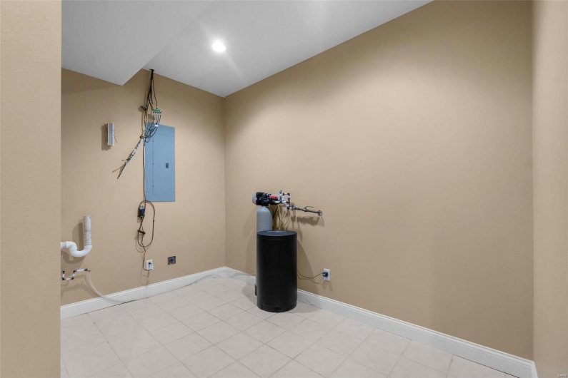 Clothes washing area with electric panel