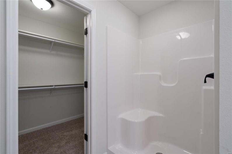 Bathroom featuring walk in shower
