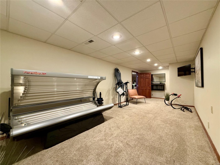 Misc room with visible vents, baseboards, a paneled ceiling, recessed lighting, and carpet flooring