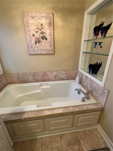Bathroom with a washtub